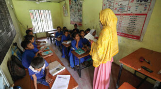 Classes have resumed in schools at Chattogram’s Satkania upazila following the recent flood. However, only a small number of students have returned to classrooms as many families are still coping with the aftermath of the flood. The photo was taken in Madarbari Nayapara Govt Primary School yesterday. Photo: Rajib Raihan