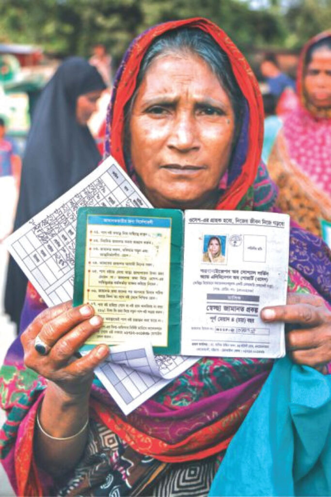 One of the victims holds a receipt book and deposit slip. Photo: Rajib Raihan